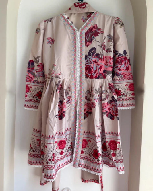 Front view of beige floral soft silk kurti with lace V-neck and pleated flared hem