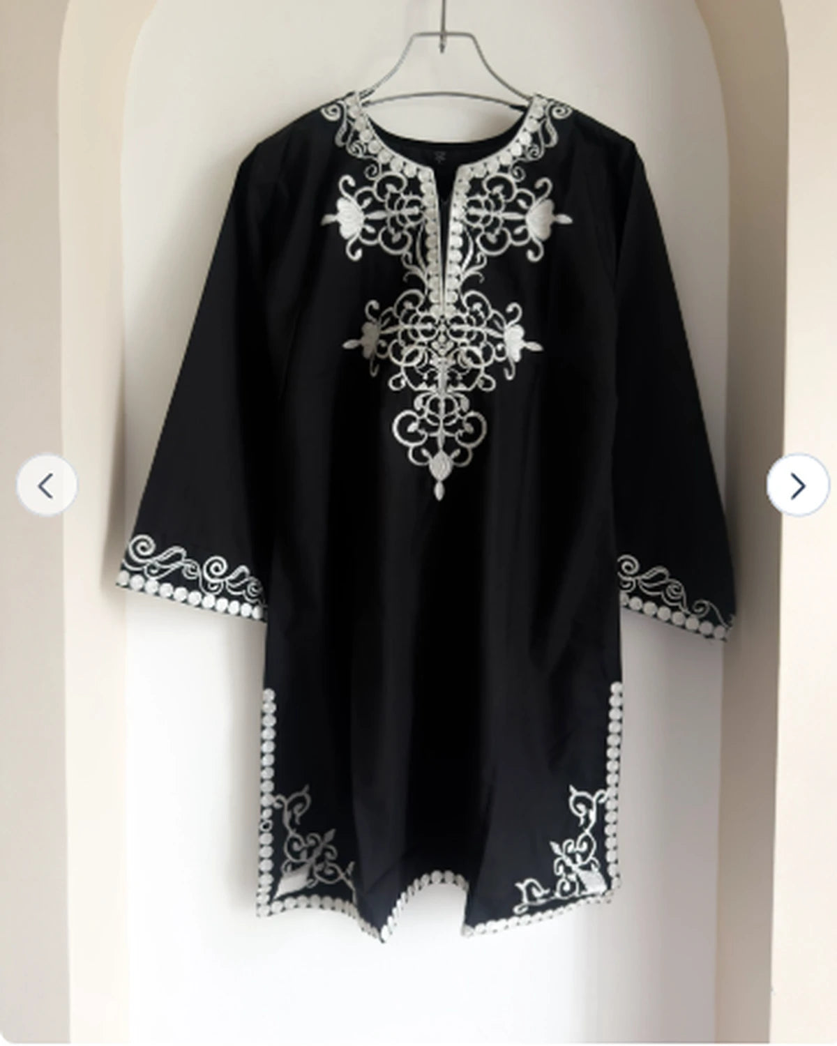 Black embroidered cotton tunic one piece with white embroidery, on hanger