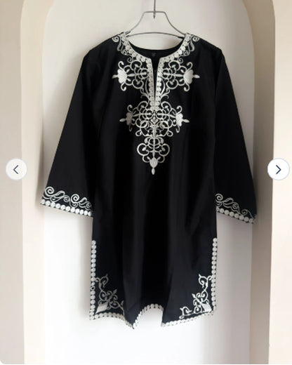 Black embroidered cotton tunic one piece with white embroidery, on hanger