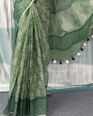 Green bandhani block print saree draped on mannequin