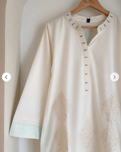 Full-length ivory embroidered cotton kurta, front flatlay view