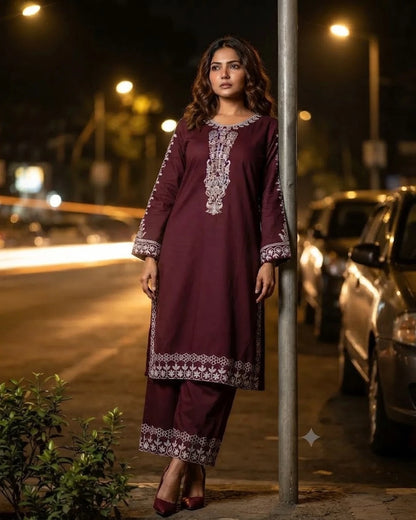 Woman wearing maroon embroidered cotton 3pc suit with matching pants, front pose