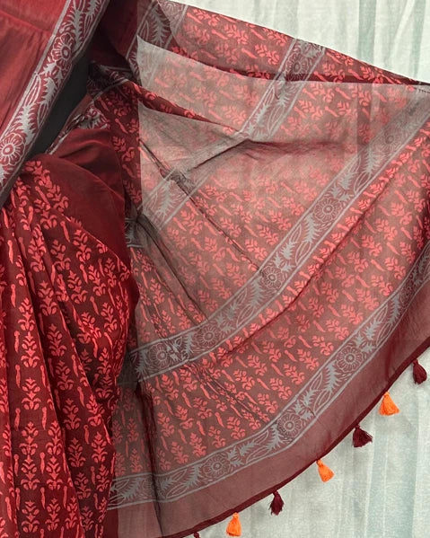 Maroon saree pallu with tassel border and block print detail