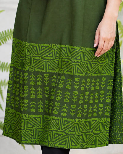 Close-up of block print hem border on olive green cotton long kurta