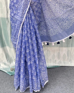 Periwinkle blue batik saree draped showing tassel border