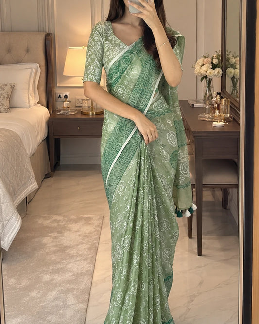 Woman wearing green block print muslin saree in mirror selfie, bedroom styling