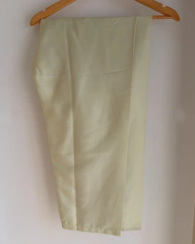Sage green silk straight-cut pants, on hanger