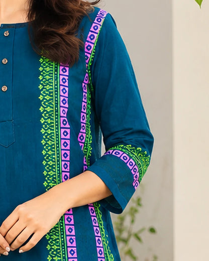 Close-up of 3/4 sleeve with printed cuff band on teal blue cotton long kurta