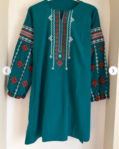Teal embroidered cotton top, front view on hanger