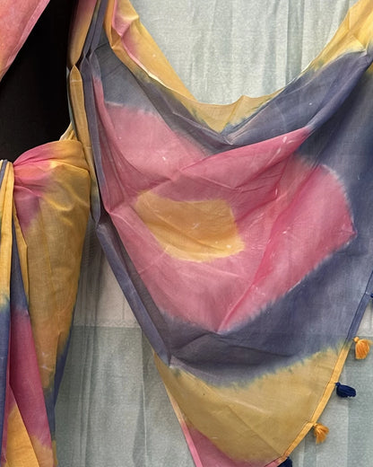 Close-up of tie-dye batik saree pallu with tassel border
