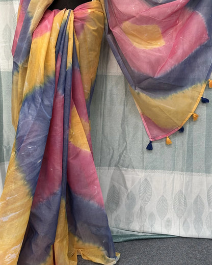 ie-dye batik saree draped showing tassel border detail